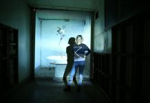 Art in unusual places Georgie Mattingley is pictured with one of her installations at the old Ajax foundry in Kyneton.