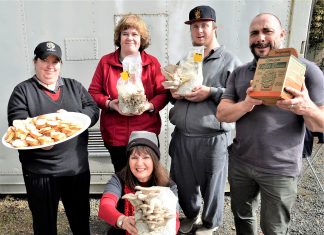 Marvellous mushrooms Windarring Urban Mushroom Farm workers Tegwen Prest, Melissa Gale and Josh Dixon with Windarring's employment pathways manager Mark Castle and team leader Mandy Fennessy.