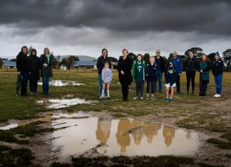 Sports precinct gains momentum Greens candidate for Northern Victoria Nicole Rowan (centre) on site at the proposed sports precinct location with members of the Macedon Ranges volleyball, netball, basketball and futsal community. Photo: Julian Meehan