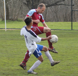 Ranger Michael Coleman secures the ball away from the opposition.