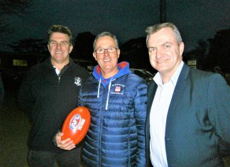 AFL kicks in $100,000 Plenty of enthusiasm: pictured at the $100,000 announcement are (from left) AFL Goldfields manager Rod Ward, Gisborne Football Netball Club president John Wood and AFL Victoria's manager Shayne Ward. The Ward brothers formerly played football and cricket at Gisborne.
