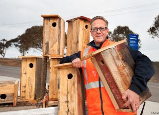 Prison inmates help threatened phascogales Acting vocational services manager at Middleton Prison Peter Foti with some of the nest boxes built by inmates to provide homes for phascogales near Barfold. Photo: Sandy Scheltema
