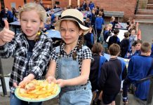 Parma charmer Young Ainsley Nash and Kate Hemphill dressed in farm-themed attire especially for Castlemaine Primary School's Parma for a Farmer lunch on Friday.