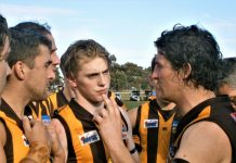 And now for the finals! Woodend-Hesket coach Tom Carland tries to inspire his side against the Bombers.
