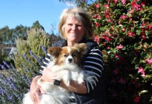 The simple joy of walking Marita is pictured with her canine companion Alfie.