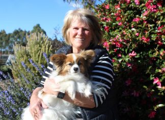 The simple joy of walking Marita is pictured with her canine companion Alfie.