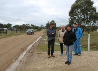 Dust up with council (L to R): Steven Wilson, Jenny Stubbs, Trish Harris and Alan Smith are pictured beside the unsealed section of Batters Lane. In the summer, traffic sends a constant stream of dust across their properties.