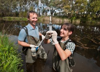 Platypus project begins! Twelve-year-old Lana Hughes, a year seven student from Kyneton Secondary College, takes one of the first water samples from the Campaspe River with platypus expert Josh Griffiths from EnviroDNA. Photo: Sandy Scheltema