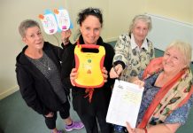 Push for defib Community health nurse Bronwyn Grieve (holding a defibrillator) with CDCH volunteers Kaye Bourke, Joan White and Lyn Hall are supporting the petition for a public after-hours defibrillator.