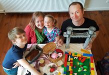 A challenge for young and old Mackinley, 7, and Indigo, 4, with mum and dad Georgina and John Hardy, work on their Kyneton Show entries. Photo: Bernadette Nunn