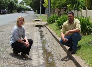 Residents gutted Edgecombe Street residents Helen and Dale Gillis are fighting a council plan to rip up the 180-year-old bluestone guttering in their street.