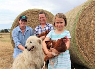 Field day to double This Farm Needs a Farmer founder Melissa Connors is pictured with The Good Life Farm Co's Claire Moore who will be exhibiting of the day and her daughter Freya Fogarty and Luca their maremma.