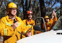 Firies back tower Benloch Fire Brigade second lieutenant Craig Longmuir, captain Gary Deer and Shelley Cowen welcome improvements to mobile network coverage.