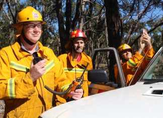 Firies back tower Benloch Fire Brigade second lieutenant Craig Longmuir, captain Gary Deer and Shelley Cowen welcome improvements to mobile network coverage.