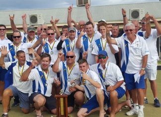 Shield drought over! Celebration mode: Central Highlands players and officials after the historic Courier Shield victory at Dunolly.