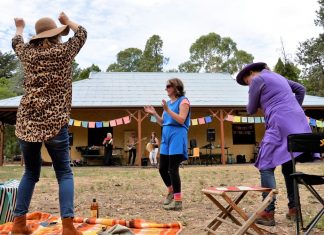 Women celebrate Cate Mercer of Castlemaine, Gen Ward of Castlemaine and Beverley Hope of Guildford couldn't resist the chance to get up and dance during Friday's International Women's Day celebration in the botanical gardens.