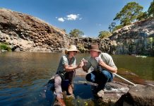 Working together to protect waterways Nick Layne, project manager for NCCMA's Healthy Coliban Catchment, and landholder Kerry Connoley take part in the UCLN's Citizen Scientist Field Day to collect platypus DNA from critical refuge areas along the Coliban and Campaspe Rivers. They are seen here collecting samples at Turpins Falls. Photo: Sandy Scheltema