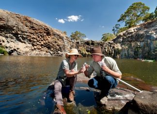 Working together to protect waterways Nick Layne, project manager for NCCMA's Healthy Coliban Catchment, and landholder Kerry Connoley take part in the UCLN's Citizen Scientist Field Day to collect platypus DNA from critical refuge areas along the Coliban and Campaspe Rivers. They are seen here collecting samples at Turpins Falls. Photo: Sandy Scheltema