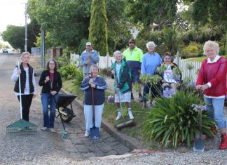 Residents vow to fight Helen Gillis, Lydia Beshara, Alf Holmes, Julie Edmondston, Shirley Francis, Dale Gillis, Betty McClure, Carole Hemming and Dawn Holmes have maintained their treasured bluestone gutters for decades.