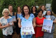 Advocates for women Neighbourhood House representatives Claire Rawlinson, Mary Hogarth, Michelle Balthazar, Vivien Philpotts, Liza Fernandes, Chloe Green and Raewyn McColley with MRSC mayor Janet Pearce (centre).
