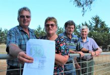Planning pigsty? Hank and Robyn Bruger with neighbours Glenn and John Langdon want the local council to lift an outdated overlay that's causing headaches for Monegeetta.