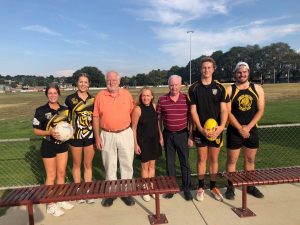 From left: Maddie Copeland (netballer), Bed Ingleton (netballer), Ian Jackson (RSL treasurer), Karen O'Sullivan, Mike Gretton (secretary) Evan Davie (U18 player) Hayden Clapham ( U18 player) at the cheque handover to rid the KFNC of its lighting debt.