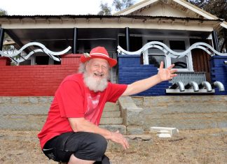This ole house … Castlemaine's Cr Max Lesser with his self imposed "art house" restoration project in Harcourt.