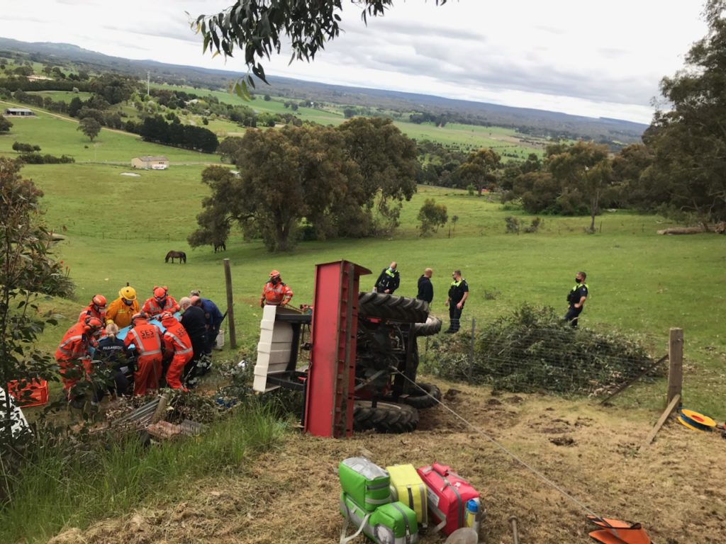 Tractor rollover traps man at New Gisborne