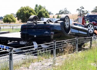 Trailer jack-knifes, ute rolls on Calder