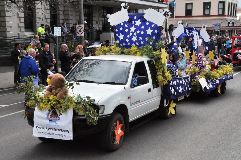 Parade remembers festival president