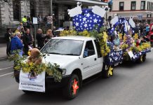 Parade remembers festival president