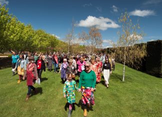 Women gather in gumboots
