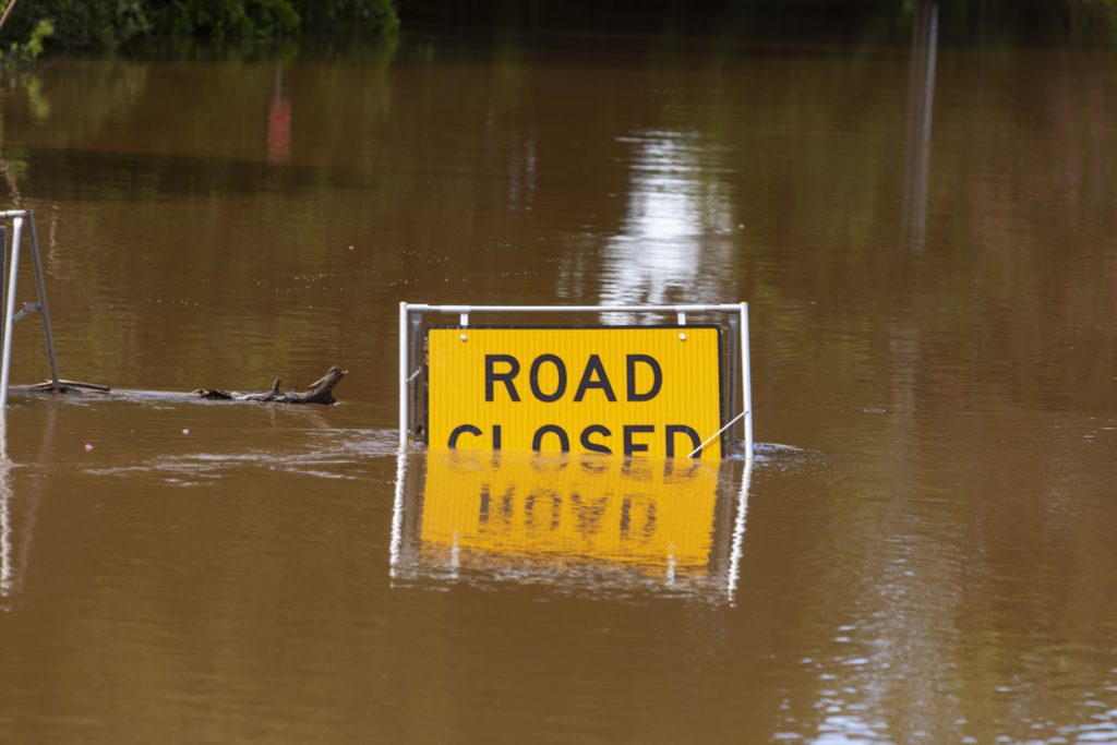 Woman rescued from flood waters