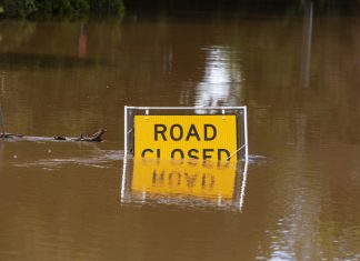 Woman rescued from flood waters