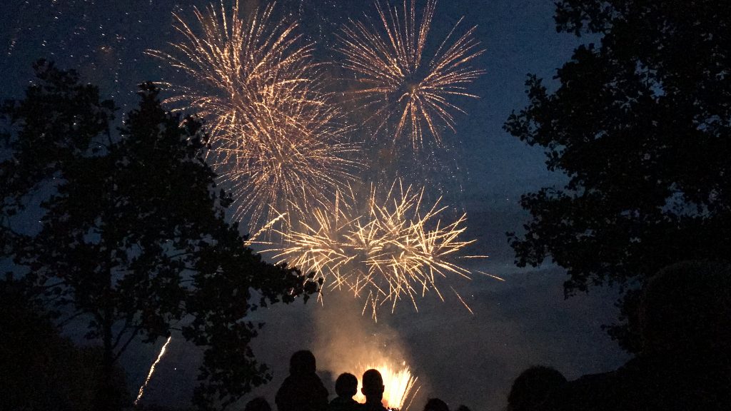 Sparks fly over fireworks