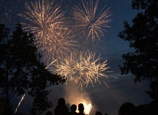 Sparks fly over fireworks