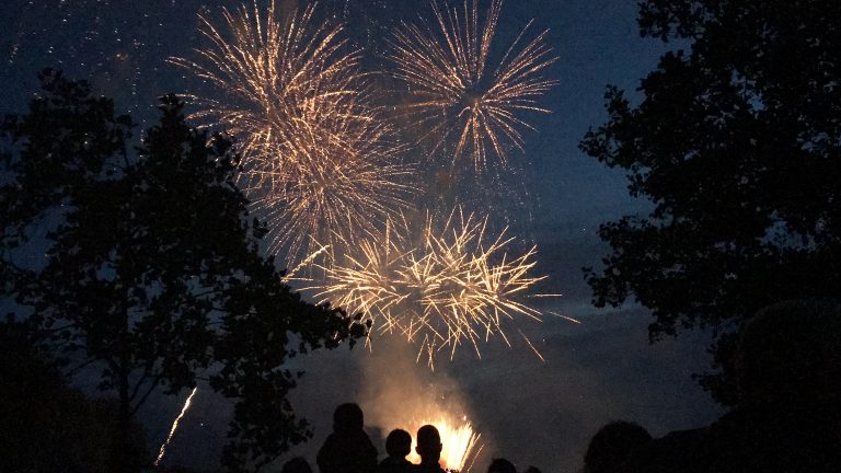 Sparks fly over fireworks