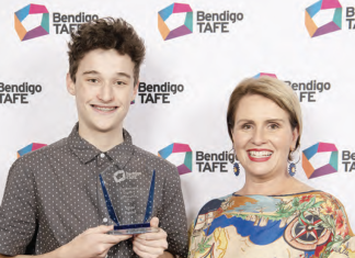 Elliot claims top award