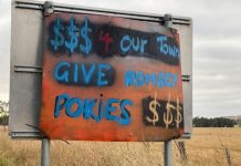 Vandals target signs in pokies fight