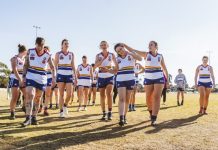 GKU three clear on top of ladder