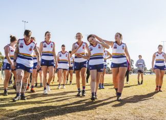 GKU three clear on top of ladder