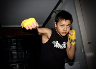 The kid with an AK47 in his hands